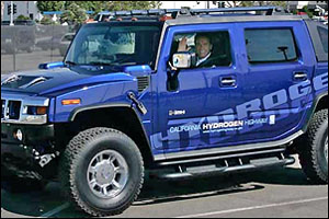 Arnold in his Blue Hummer.